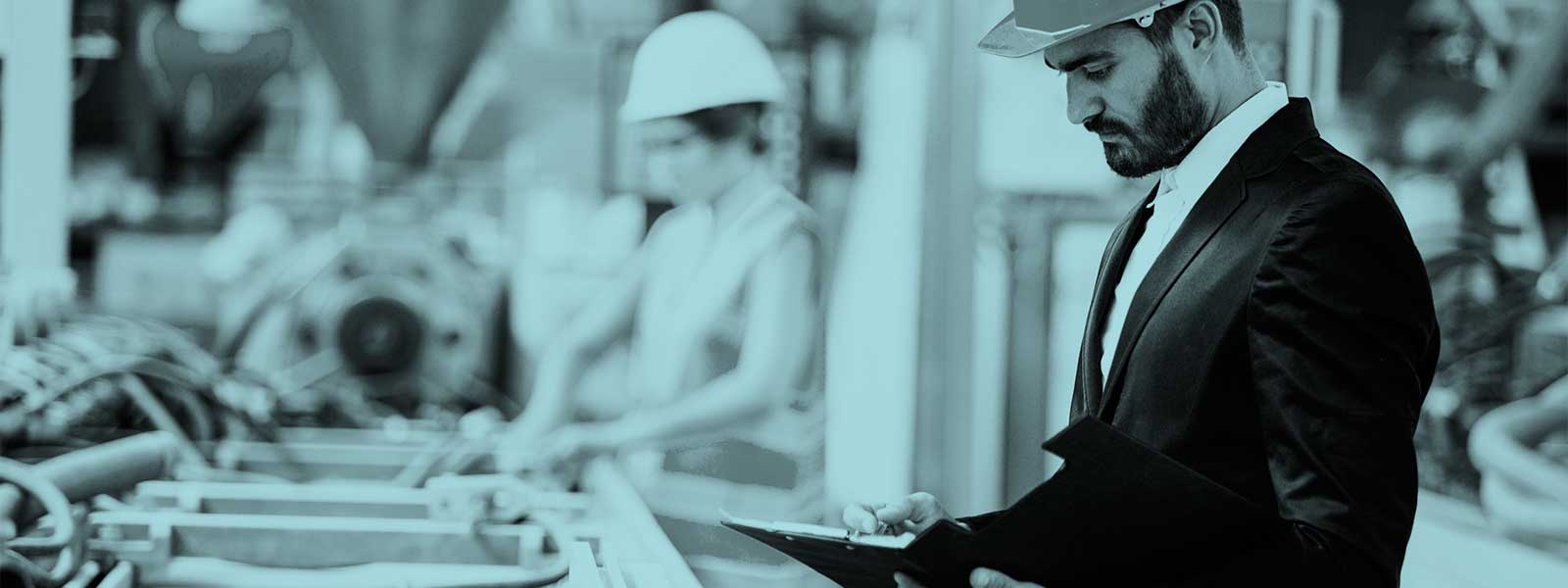 Factory worker carrying out inspection