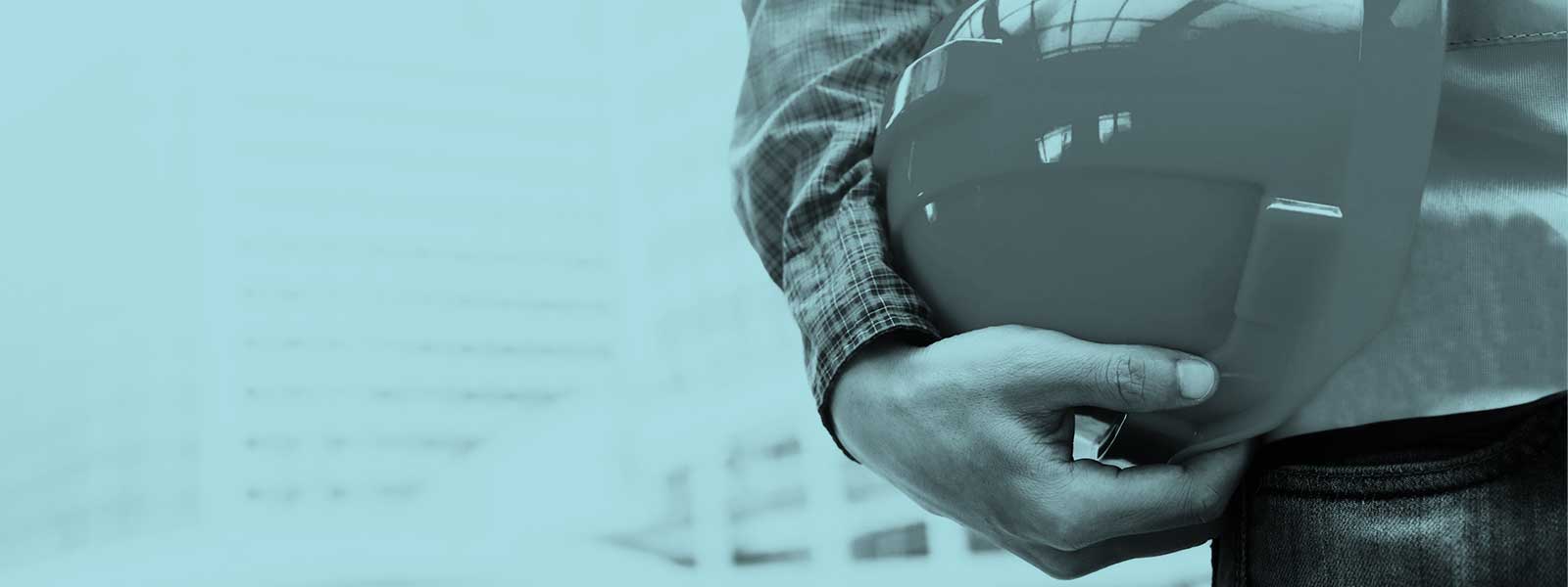 a close up of someone holding a hard hat