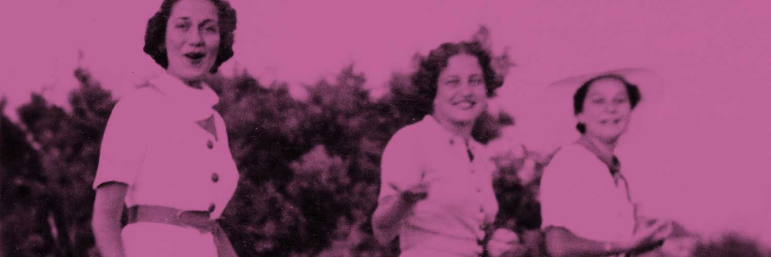 Vintage photo of three people smiling and walking