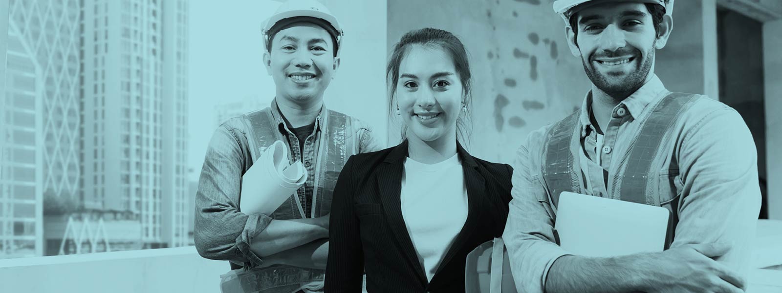 Three people at a construction site