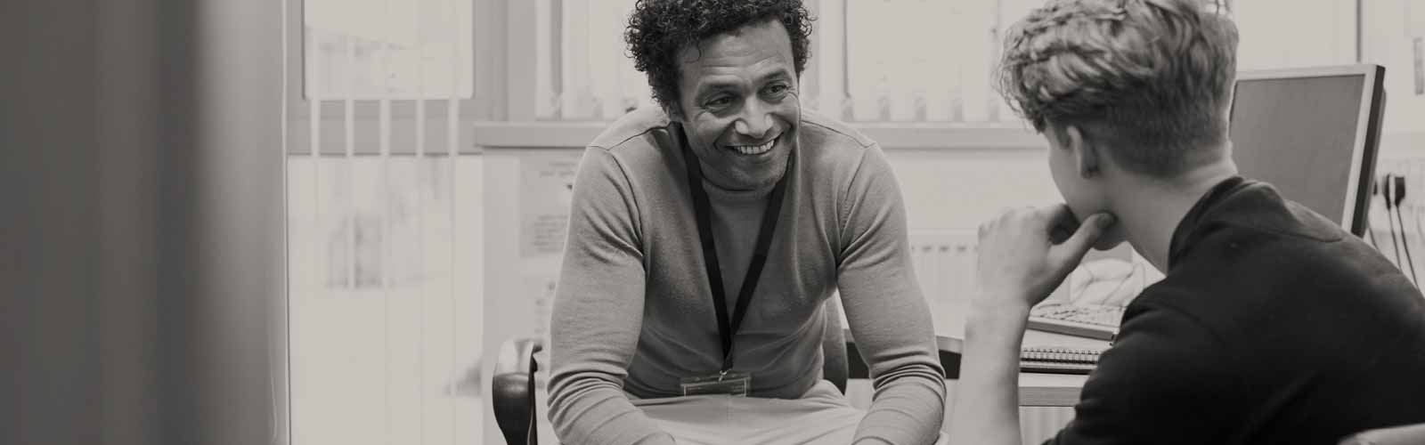 Two people in discussion