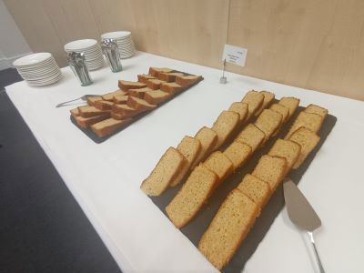 Delegates enjoy vegan lemon drizzle cake in the networking area