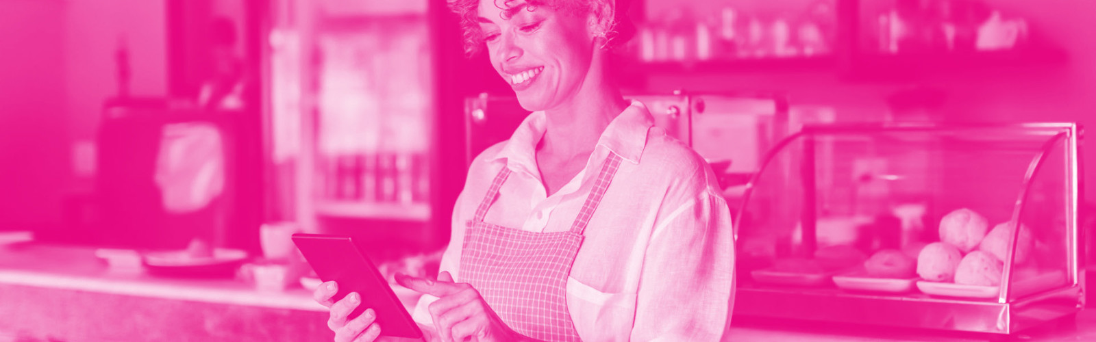 Cafe worker using a tablet