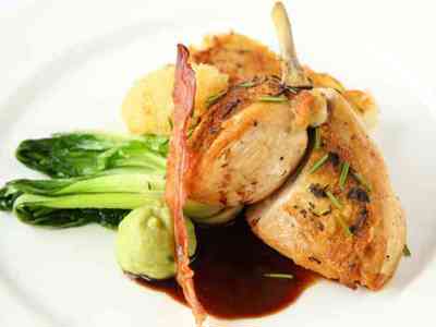 Boulevard Events: seared chicken breast, rösti potato, leek puree, Parma ham crisp, pan fried bok choi and lemon thyme sauce