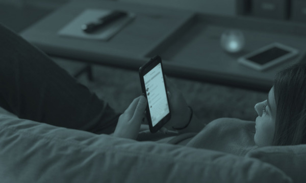 Person using their mobile phone to shop online