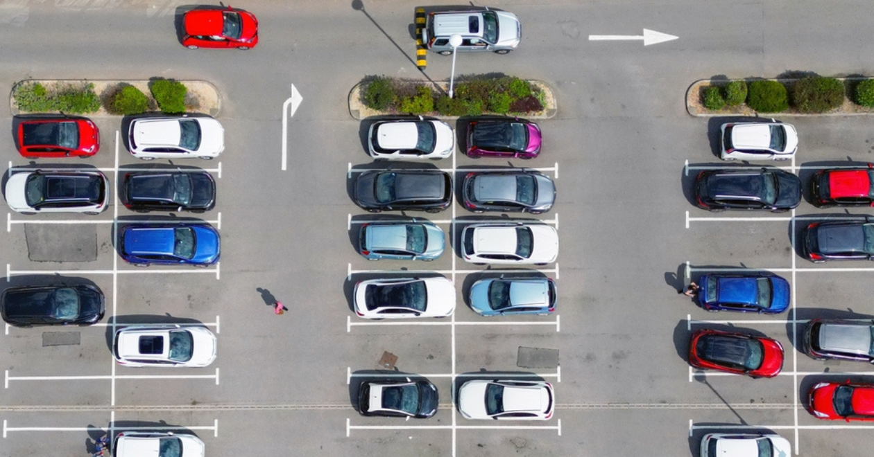Car park with a variety of cars