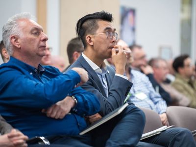 Delegates attend seminar in the Elements Suite