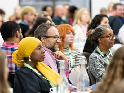 Delegates listen to a talk at SEL Mind connect conference