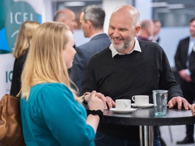 Delegates enjoying refreshments and networking in the Ozone room