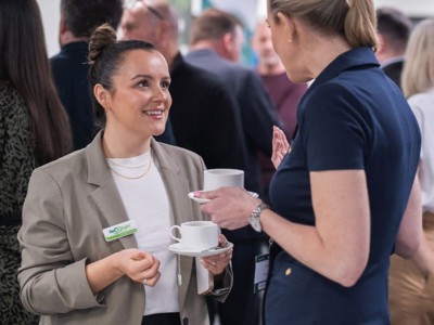 Delegates enjoying refreshments and networking in the Ozone room