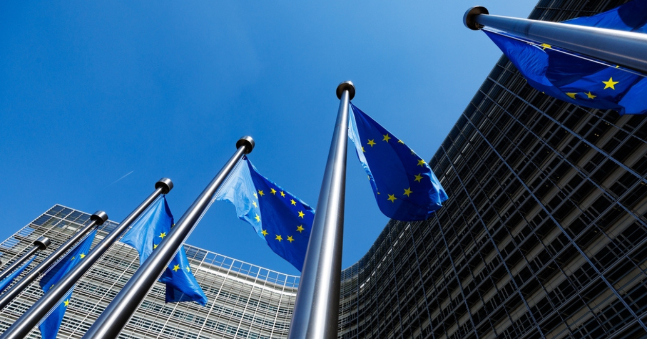 European flags in front of the Berlaymont building, headquarters of the European Commission in Brussels, Belgium