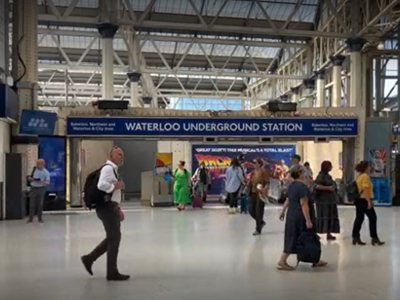 Commuters walking from London Waterloo Underground Station