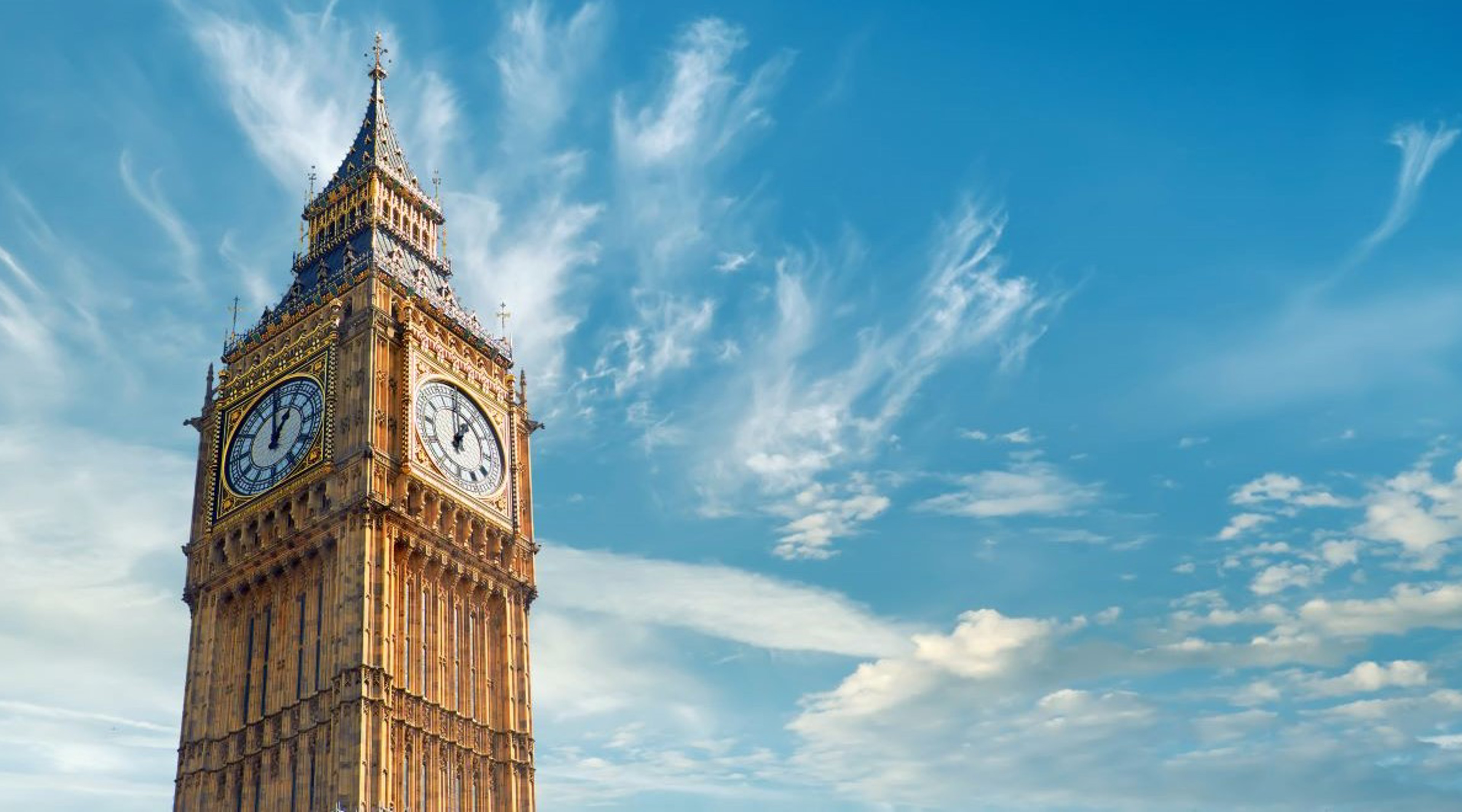 View of Big Ben, The Houses of Parliament, set against a blue sky