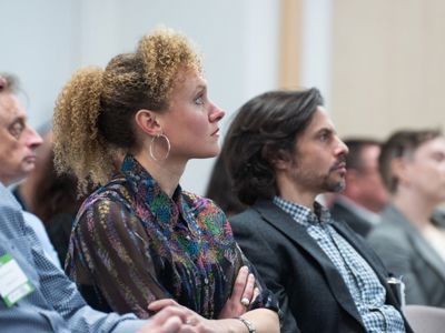 Delegates attend seminar in the Elements Suite