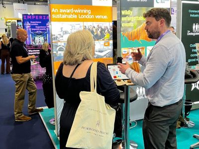 Joe Harris with a client at the 15Hatfields stand at The Meetings Show 2025