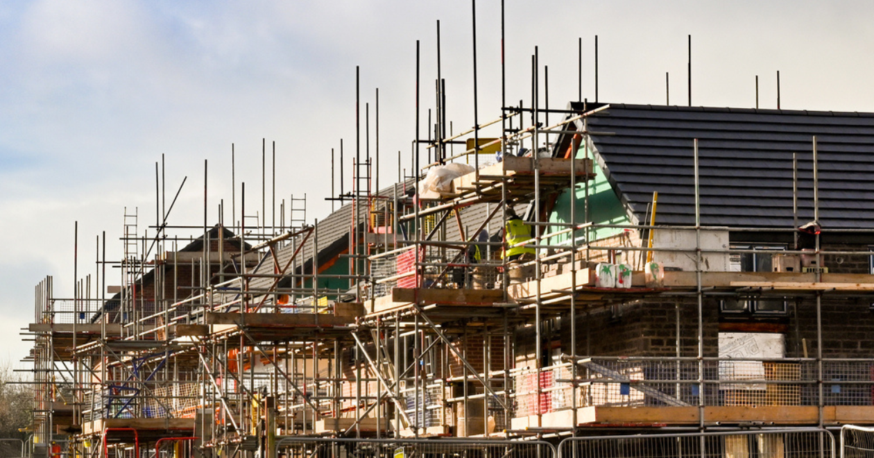 Scaffolding around houses being built on a new housing development