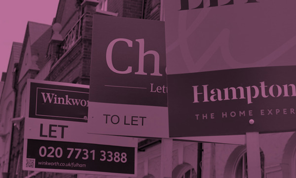 To let signs in front of a row of houses