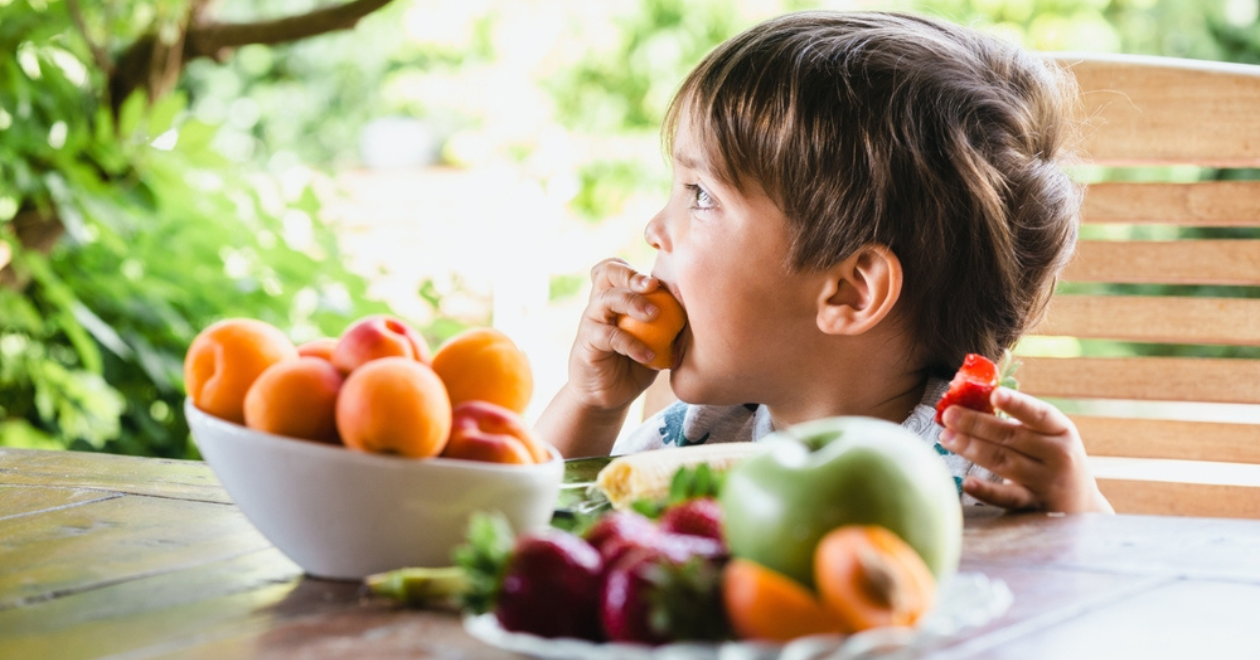 Child eating fruit