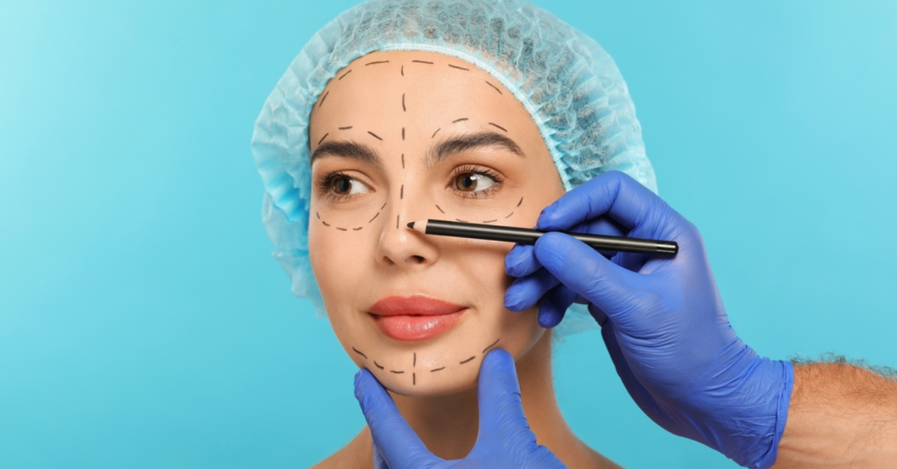 Closeup of a patient's face being prepared for cosmetic surgery