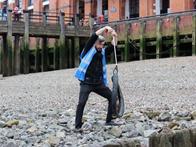 Mark, 15Hatfields' Venue Supervisor looks alarmed as he finds a tyre on the banks of the Thames