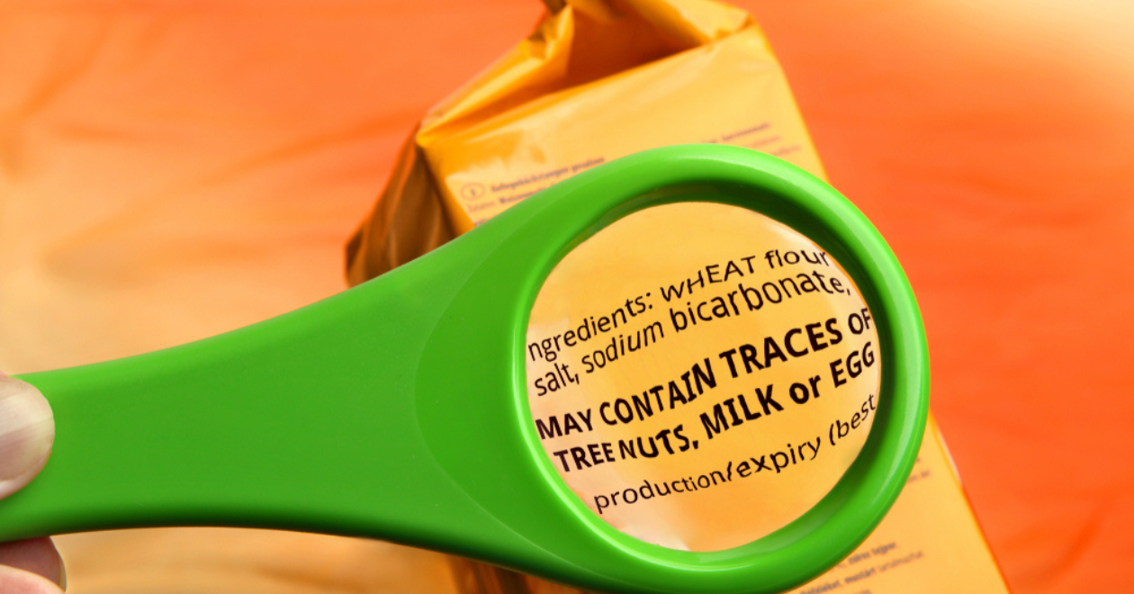 Magnifying glass on food ingredients and additives label