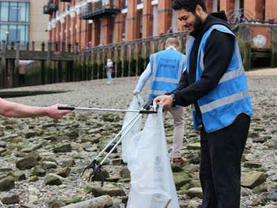 Liam, Venue Supervisor, litter picking on the Thames